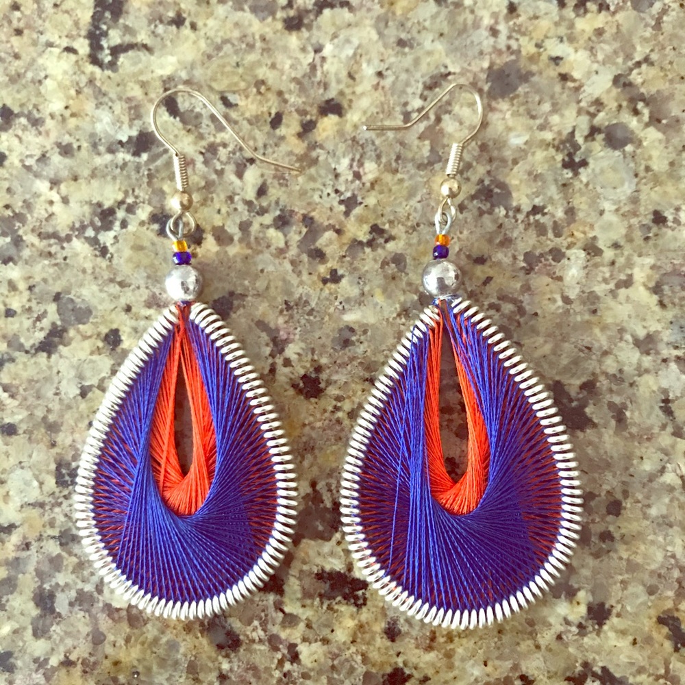 Royal blue and orange earrings.